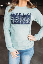 Load image into Gallery viewer, Raising Our Kids- Long Sleeve Tee